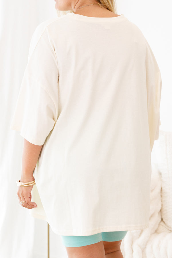 Plus Size ivory oversized boyfriend tee with a striped smiley face and palm tree sunglasses graphic.