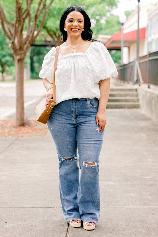 Chic Soul plus size clothing, high rise medium wash denim flare jeans with holes and light distressing on the knee