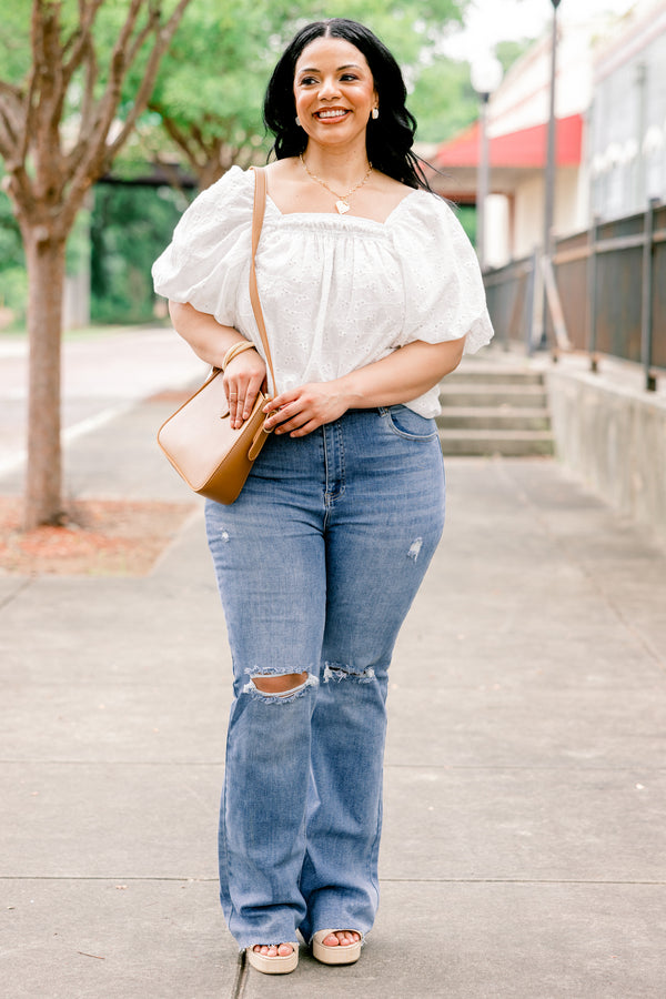 Chic Soul plus size clothing, high rise medium wash denim flare jeans with holes and light distressing on the knee
