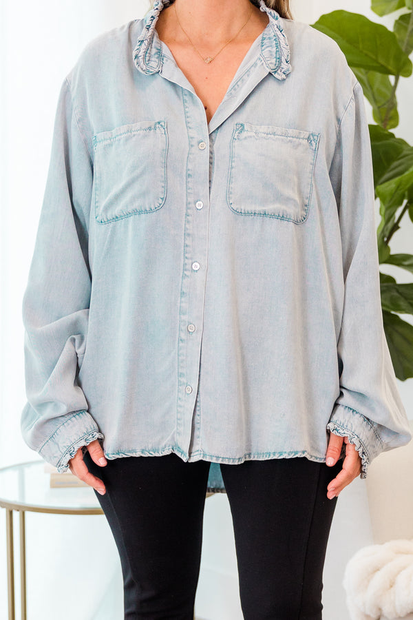Chic Soul plus size clothing, long sleeve light wash denim button up top with ruffle collar and two chest pockets with cuff sleeves