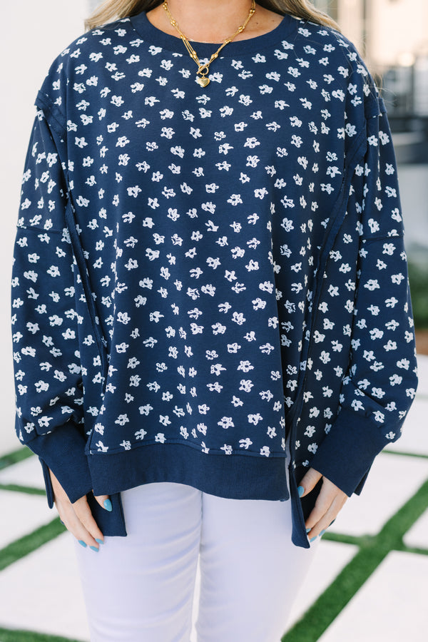 Chic Soul plus size clothing, navy and white floral print long sleeve crewneck oversized pullover with slits on the hip