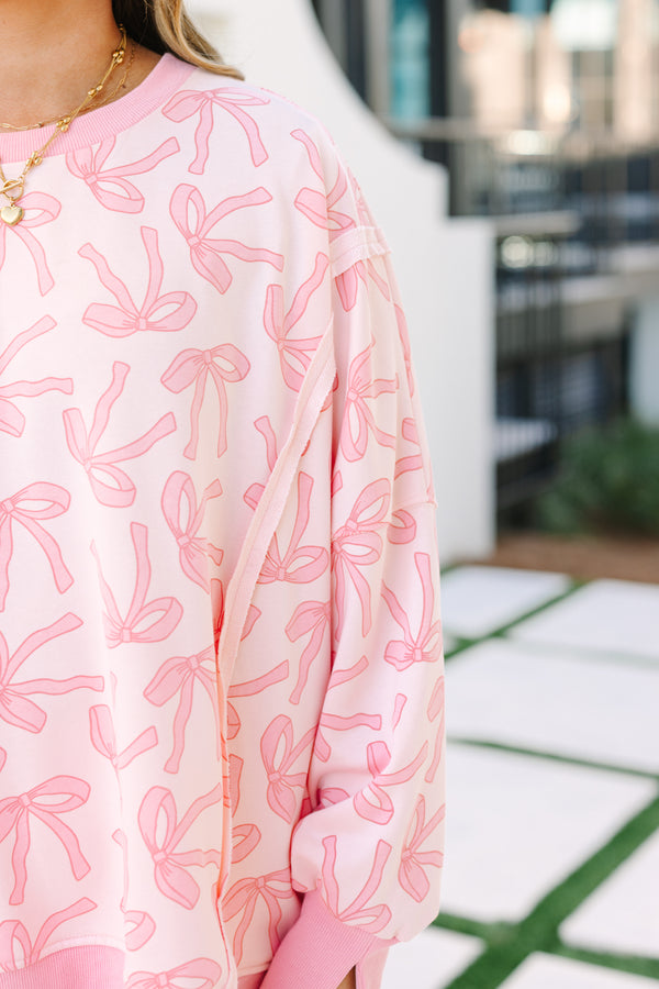 Chic Soul plus size clothing, pink ribbon pullover with side slits and exposed seams