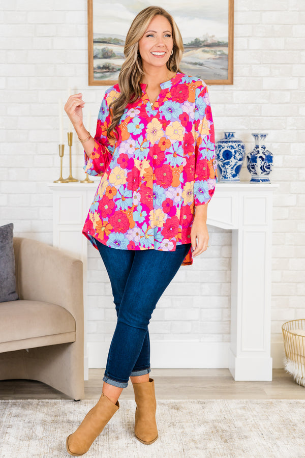 Chic Soul plus size clothing, quarter-sleeve multi-colored v-neckline top with a bright multi-colored floral pattern
