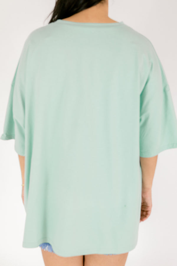 Chic Soul plus size clothing, light green oversized boyfriend tee with sunset graphic