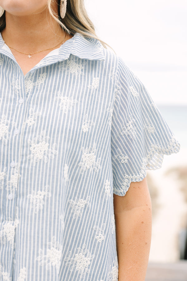 Chic Soul plus size clothing, blue striped knee length dress with short short sleeves buttons going down to the lower chest area as well as cream floral embroidery throughout the dress and along the bottom of each sleeve 
