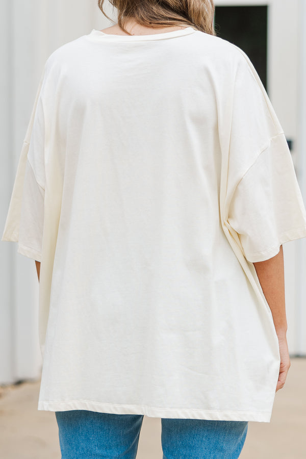 Plus Size ivory oversized boyfriend tee with a Sweet Land of Liberty horse graphic and blue jeans.