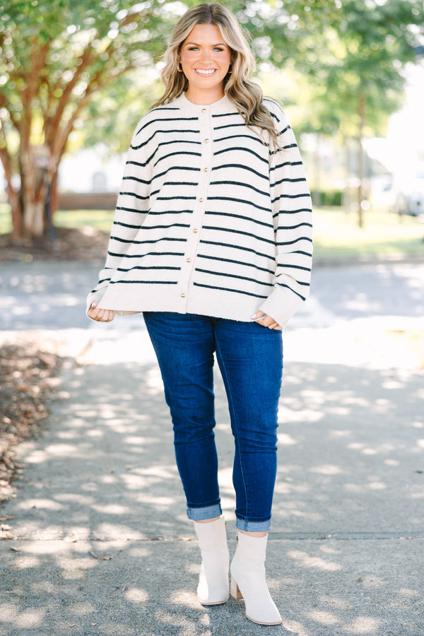 Plus Size oatmeal cardigan with black horizontal stripes, gold buttons, and a crew neckline.