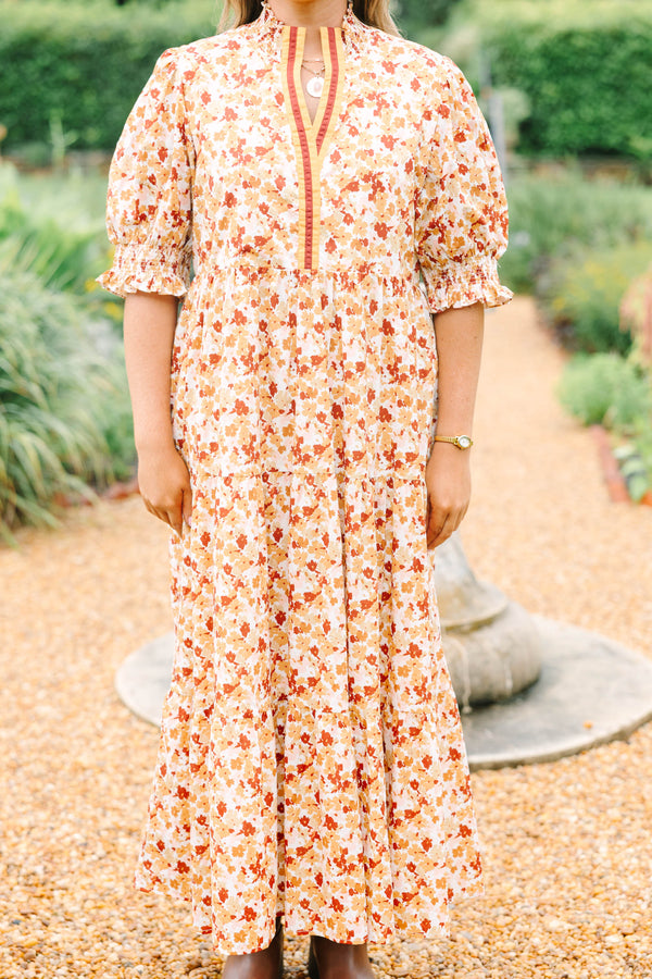 Plus Size brown floral maxi dress with a smocked collar, puff sleeves, and tiered body.