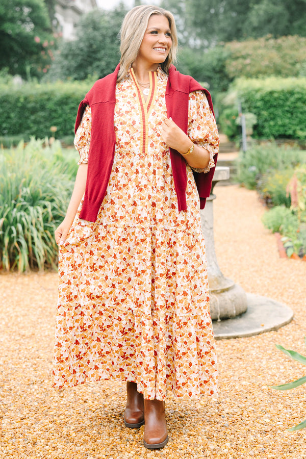 Plus Size brown floral maxi dress with a smocked collar, puff sleeves, and tiered body.
