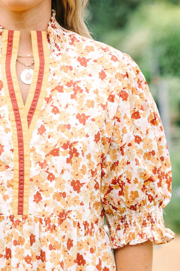Plus Size brown floral maxi dress with a smocked collar, puff sleeves, and tiered body.