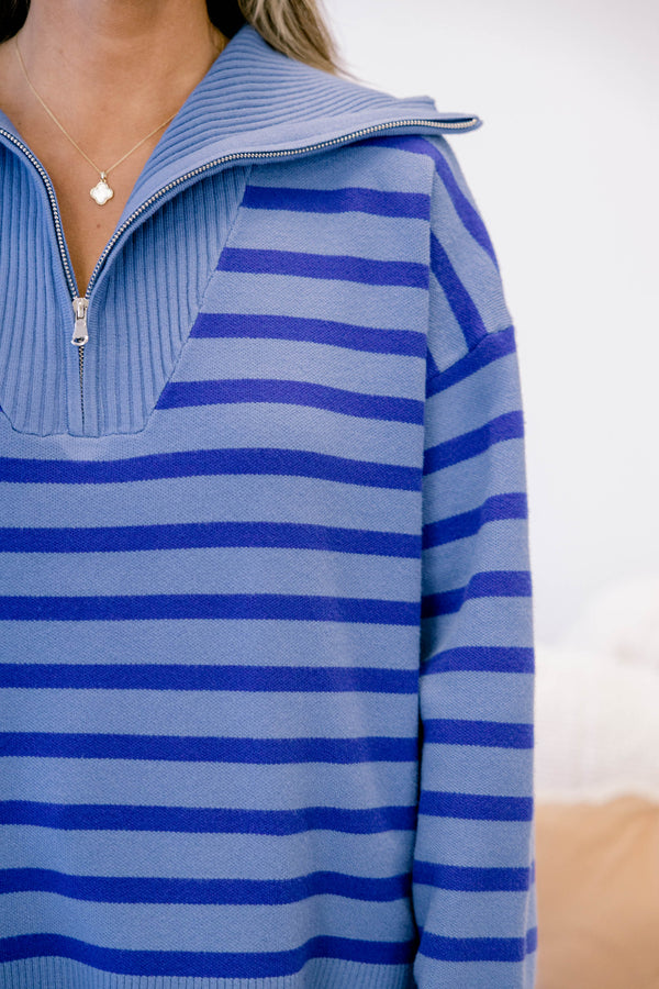 Chic Soul plus size clothing, blue sweater with a darker blue striped pattern as well as a zipper that goes down to the chest 
