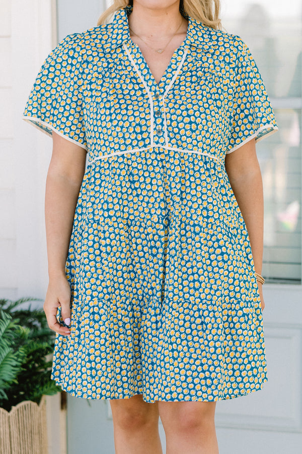 Chic Soul plus size clothing, short-sleeve collared teal mix baby doll dress with a white piping along the sleeves and bodice and a teal and yellow abstract spotted floral pattern 