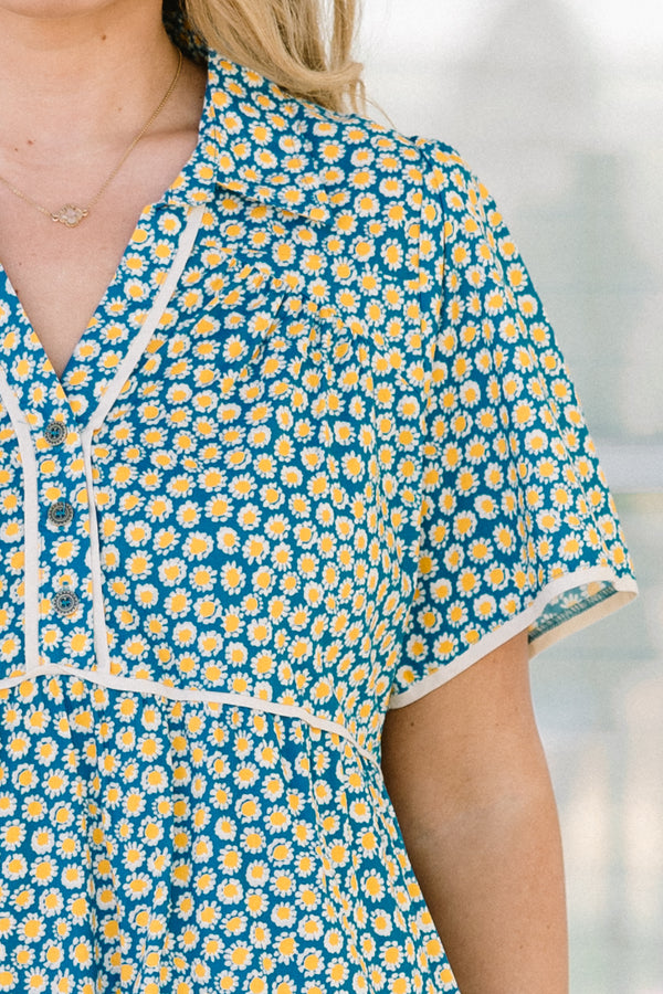 Chic Soul plus size clothing, short-sleeve collared teal mix baby doll dress with a white piping along the sleeves and bodice and a teal and yellow abstract spotted floral pattern 