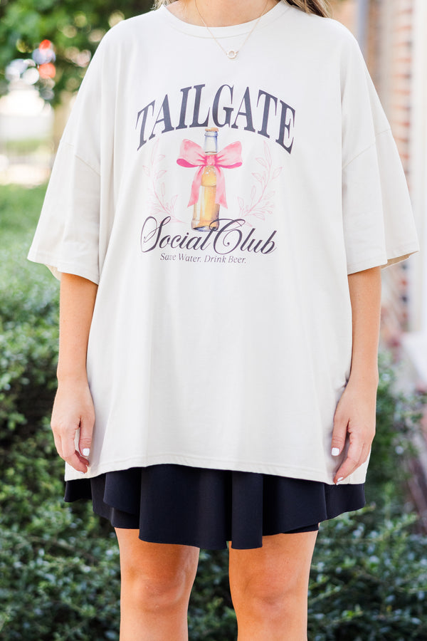 Chic Soul plus size clothing, short-sleeve dust light tan boyfriend tee with graphic stating 