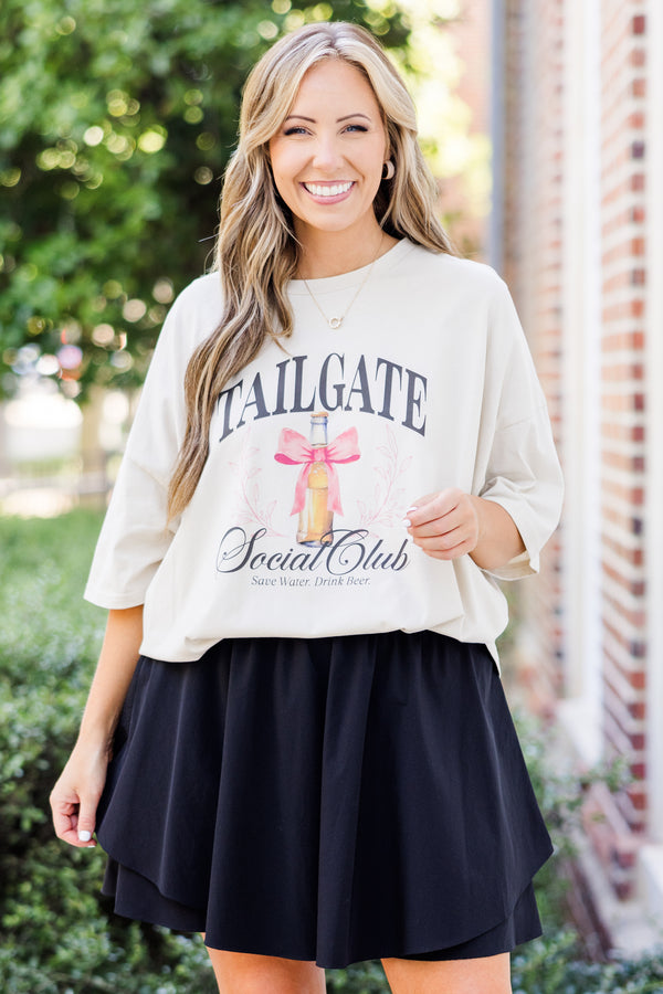 Chic Soul plus size clothing, short-sleeve dust light tan boyfriend tee with graphic stating 
