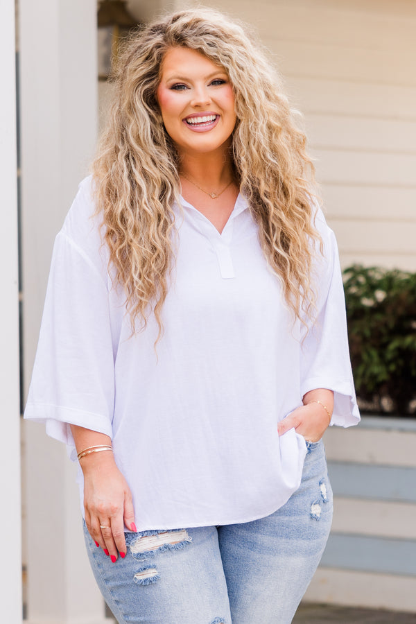 Plus Size off-white linen top with three-quarter sleeves and a notched v-neck collar.