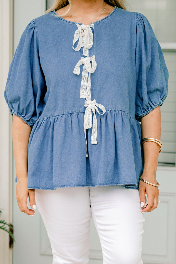 Chic Soul plus size clothing, denim top with three bows going down the  center of the shirt and bubble sleeves 