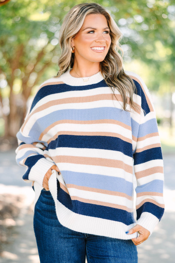 Plus Size oversized crewneck sweater with horizontal stripes in navy, light blue, tan, and white.