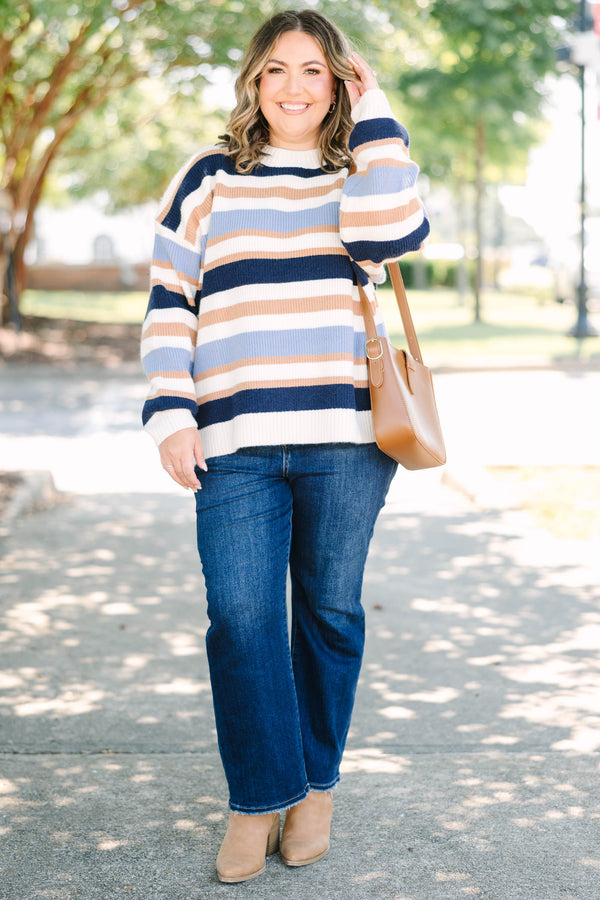 Plus Size oversized crewneck sweater with horizontal stripes in navy, light blue, tan, and white.