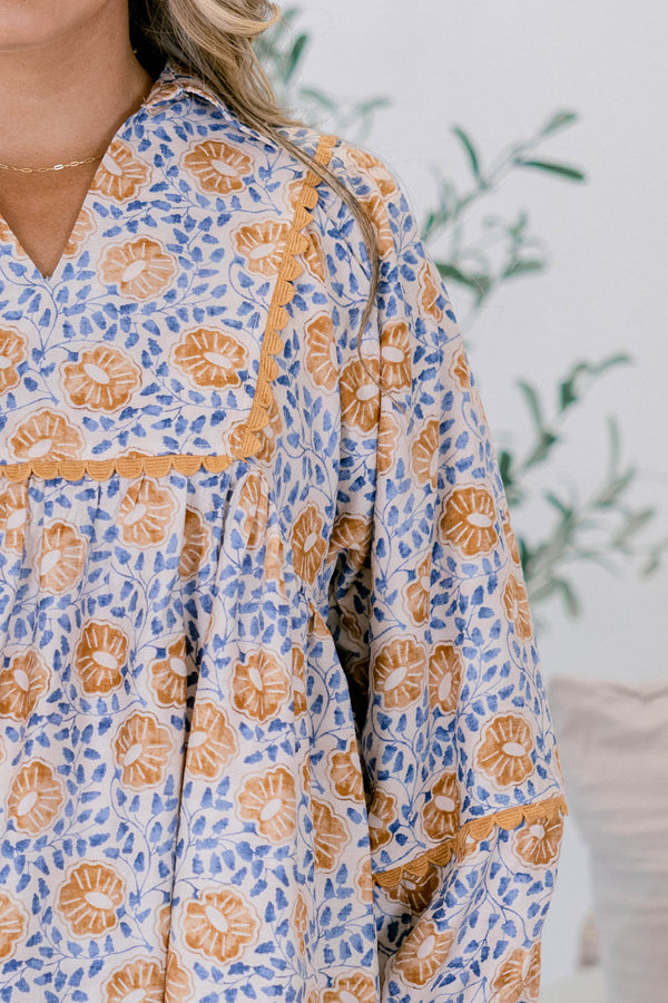 Chic Soul plus size clothing, blue and yellow floral print long sleeve baby doll top with v neck cutout 