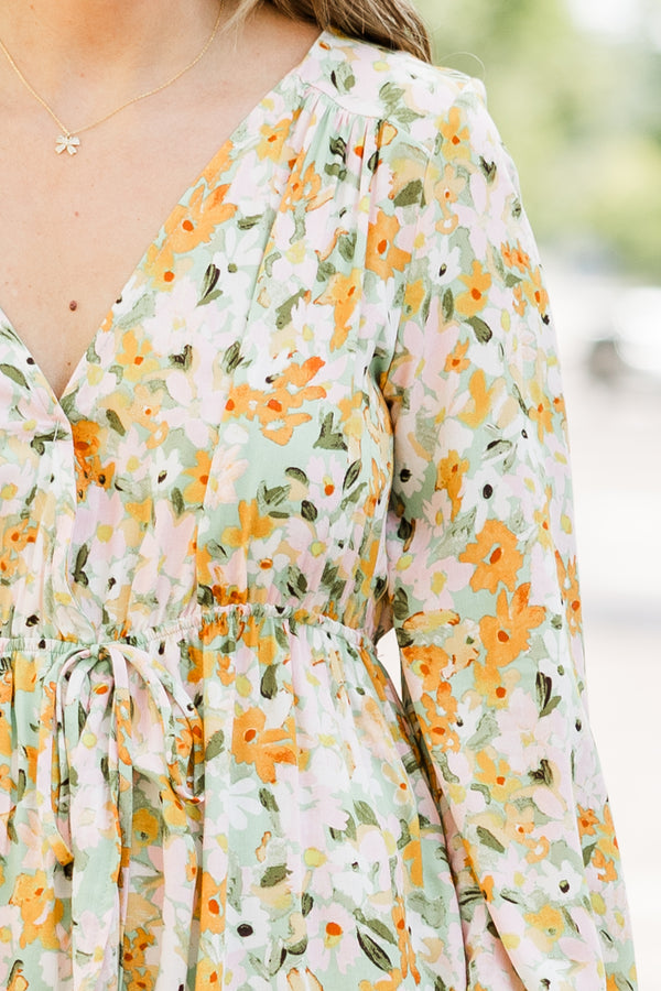 Chic Soul plus size clothing, long sleeve midi dress with cinched waist tie and orange, green, white floral pattern