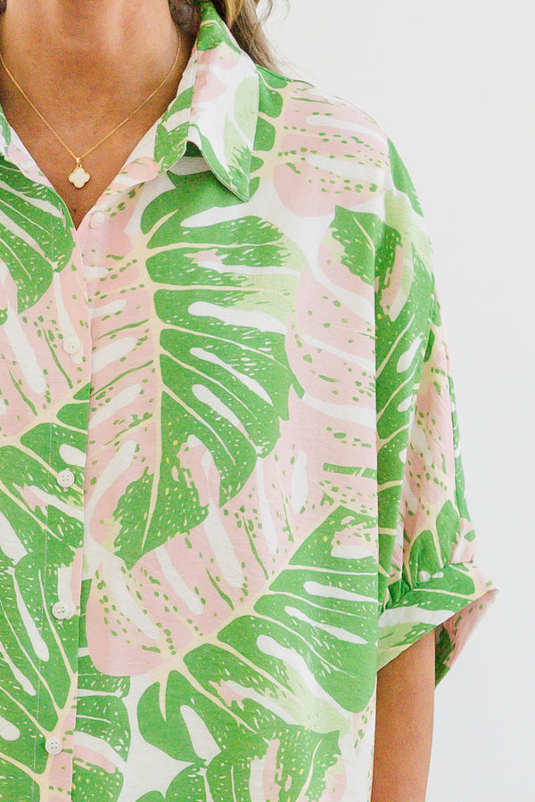 Chic Soul plus size clothing, green short sleeve button up top with collar detail with bubble cuff sleeves with green tropical leaf print