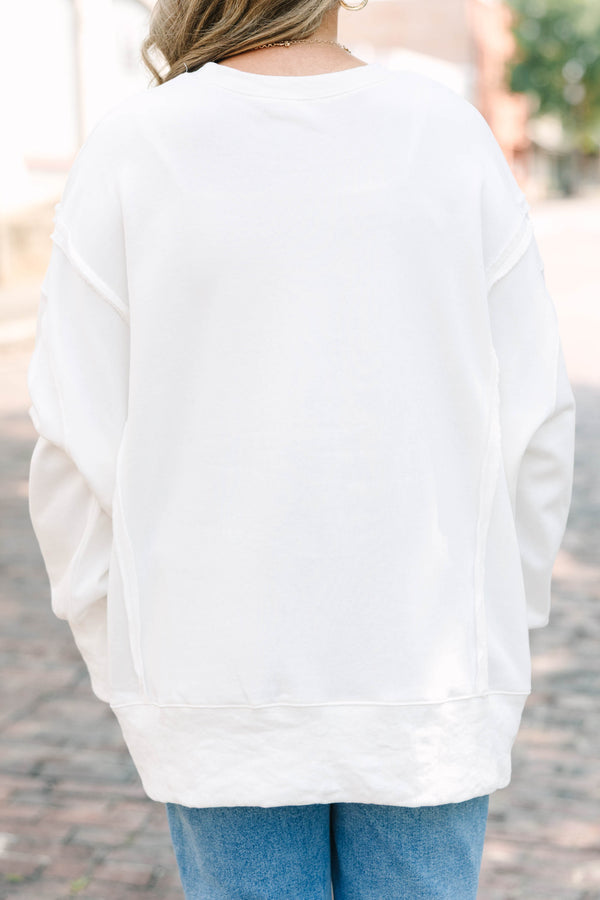 Plus Size ivory crew neck sweatshirt with a colorful 
