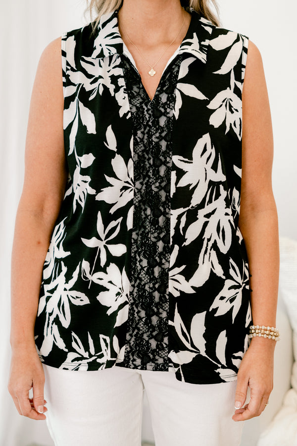 chic soul plus size clothing, black tank with a white floral pattern and a black lace strip down the center of the shir, it has a slight v-neckline 