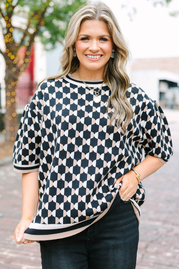 Plus Size black and tan geometric pattern short sleeve sweater with a crew neckline.
