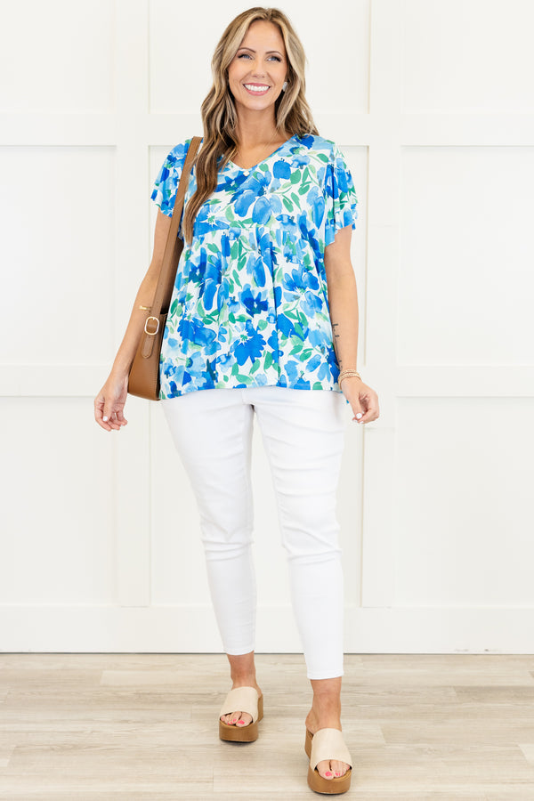 Chic Soul plus size clothing, blue short sleeve top with large floral print with v neckline with flutter sleeves