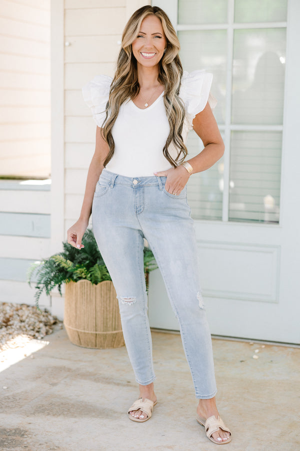 Chic Soul plus size clothing, light wash skinny jean with light distressing on the knees