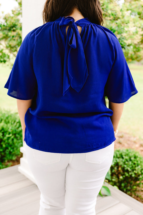 Chic Soul plus size clothing, royal blue blouse with a high neckline and flowy sleeves