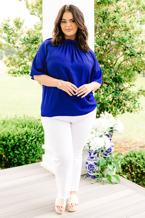 Chic Soul plus size clothing, royal blue blouse with a high neckline and flowy sleeves