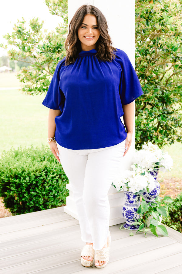 Chic Soul plus size clothing, royal blue blouse with a high neckline and flowy sleeves