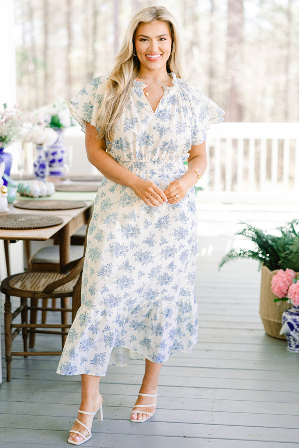 Chic Soul plus size clothing, short-puffed-sleeve flowy ruffled white midi dress with a scalloped split-v-neckline and a subtle blue floral pattern with a smocked waistline 