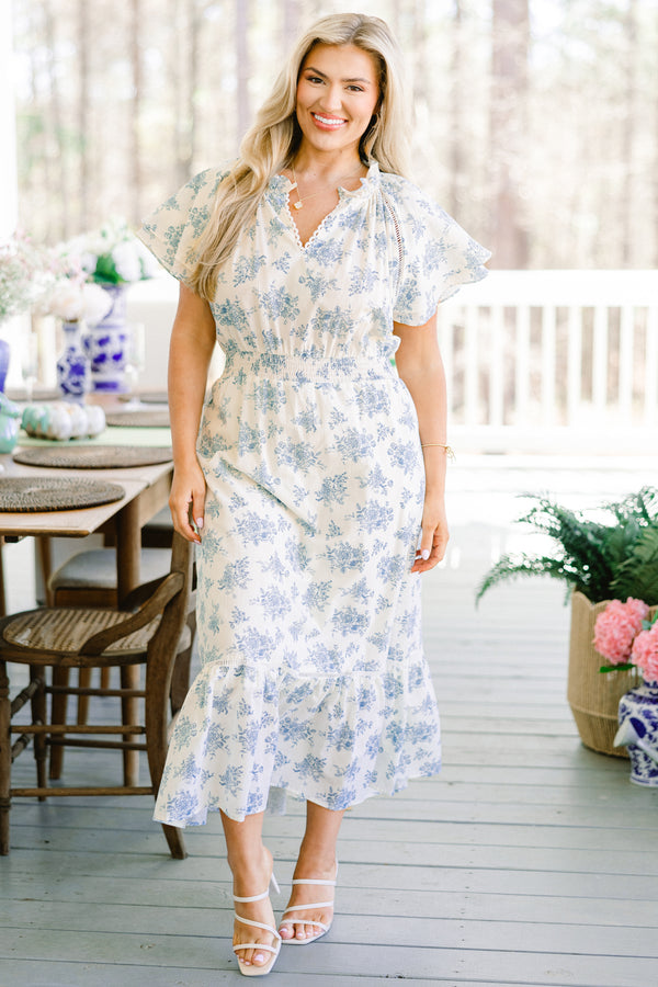 Chic Soul plus size clothing, short-puffed-sleeve flowy ruffled white midi dress with a scalloped split-v-neckline and a subtle blue floral pattern with a smocked waistline 