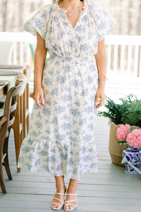 Chic Soul plus size clothing, short-puffed-sleeve flowy ruffled white midi dress with a scalloped split-v-neckline and a subtle blue floral pattern with a smocked waistline 