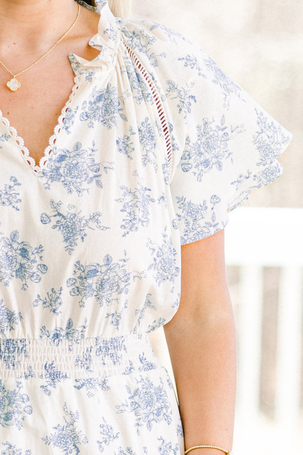 Chic Soul plus size clothing, short-puffed-sleeve flowy ruffled white midi dress with a scalloped split-v-neckline and a subtle blue floral pattern with a smocked waistline 