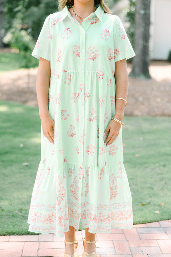 Plus Size mint green floral midi dress with short sleeves, a collared neckline, and button front.
