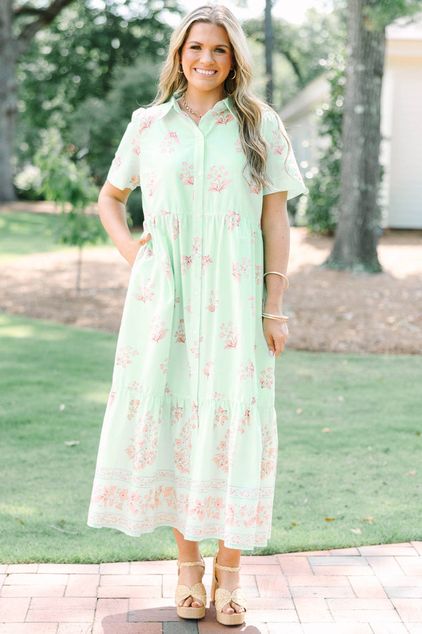 Plus Size mint green floral midi dress with short sleeves, a collared neckline, and button front.