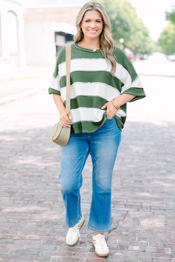 Plus Size army green and white striped French terry top with exposed seams and a relaxed fit.