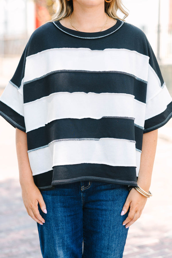 Plus Size black and white horizontal striped top with raw-edge seams and short sleeves.
