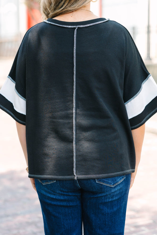 Plus Size black and white horizontal striped top with raw-edge seams and short sleeves.