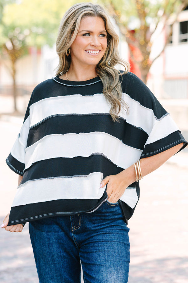 Plus Size black and white horizontal striped top with raw-edge seams and short sleeves.