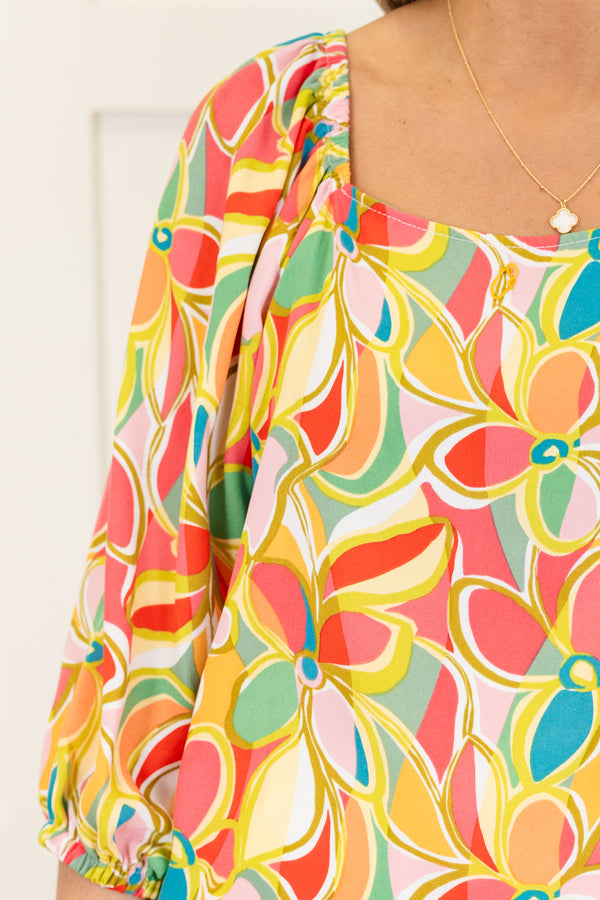 Chic Soul plus size clothing, quarter-sleeve square-neckline pink top with a yellow and orange abstract geometric floral pattern 