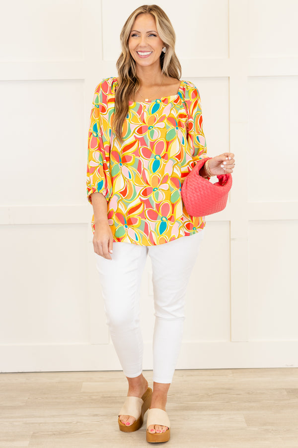 Chic Soul plus size clothing, quarter-sleeve square-neckline pink top with a yellow and orange abstract geometric floral pattern 