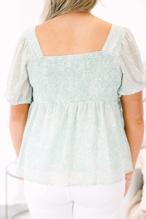 Plus Size sage floral babydoll top with a sweetheart neckline and puff sleeves.