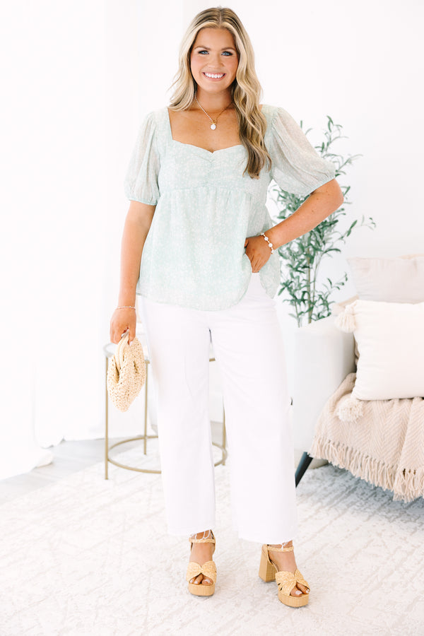 Plus Size sage floral babydoll top with a sweetheart neckline and puff sleeves.