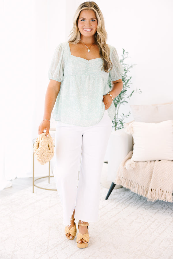 Plus Size sage floral babydoll top with a sweetheart neckline and puff sleeves.
