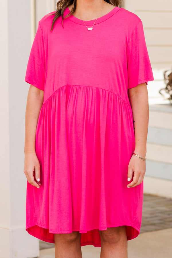 Plus Size fuchsia short sleeve babydoll dress with a round neckline and high-low hemline.